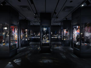 Wide view of the interior of the Meister Gallery featuring multiple glass cases filled with jewelry.