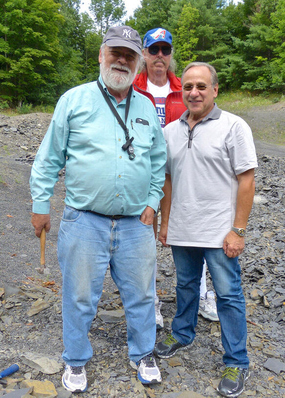 Niles Eldredge (left) and trilobite editors Andy Secher (middle) and Martin Shugar (right) stand outside at Devonian Quarry.