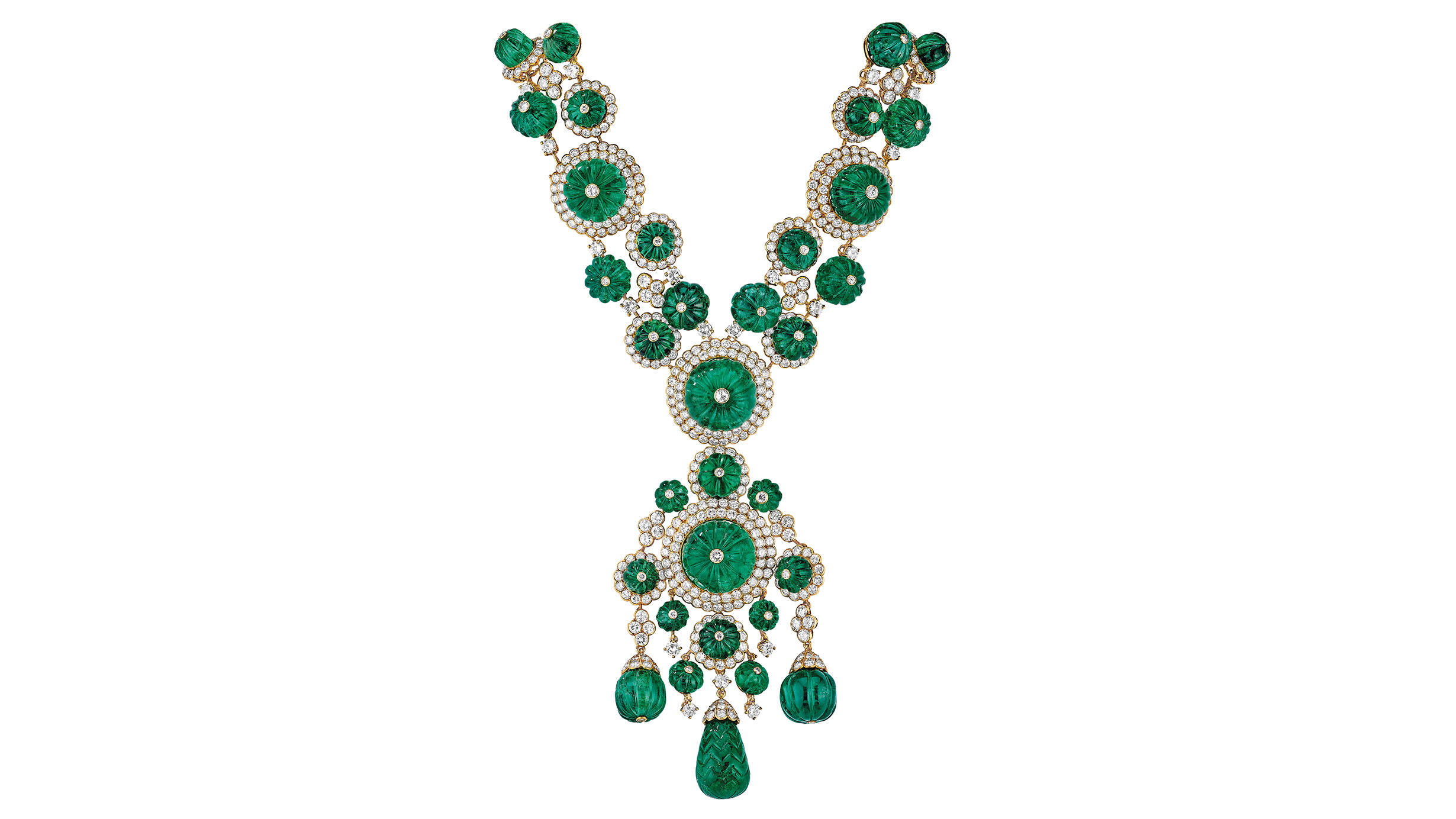 Emerald and diamond necklace ending in an elaborate pendant.