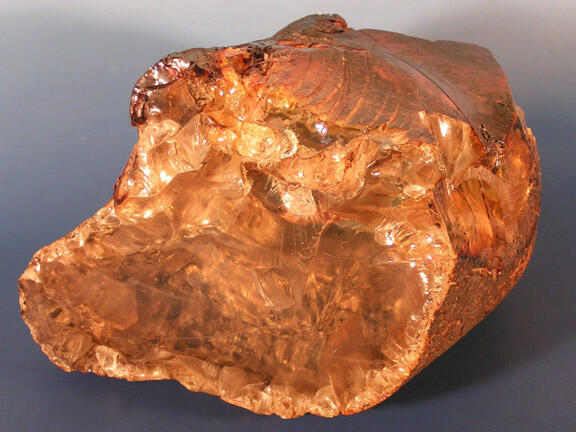 A large specimen of amber rock.