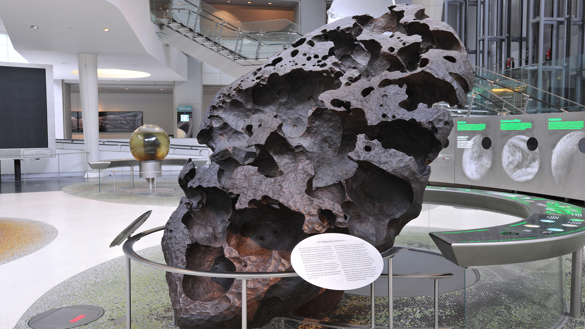 The 15.5-ton Willamette meteorite is displayed standing on end in the Hall of the Universe.