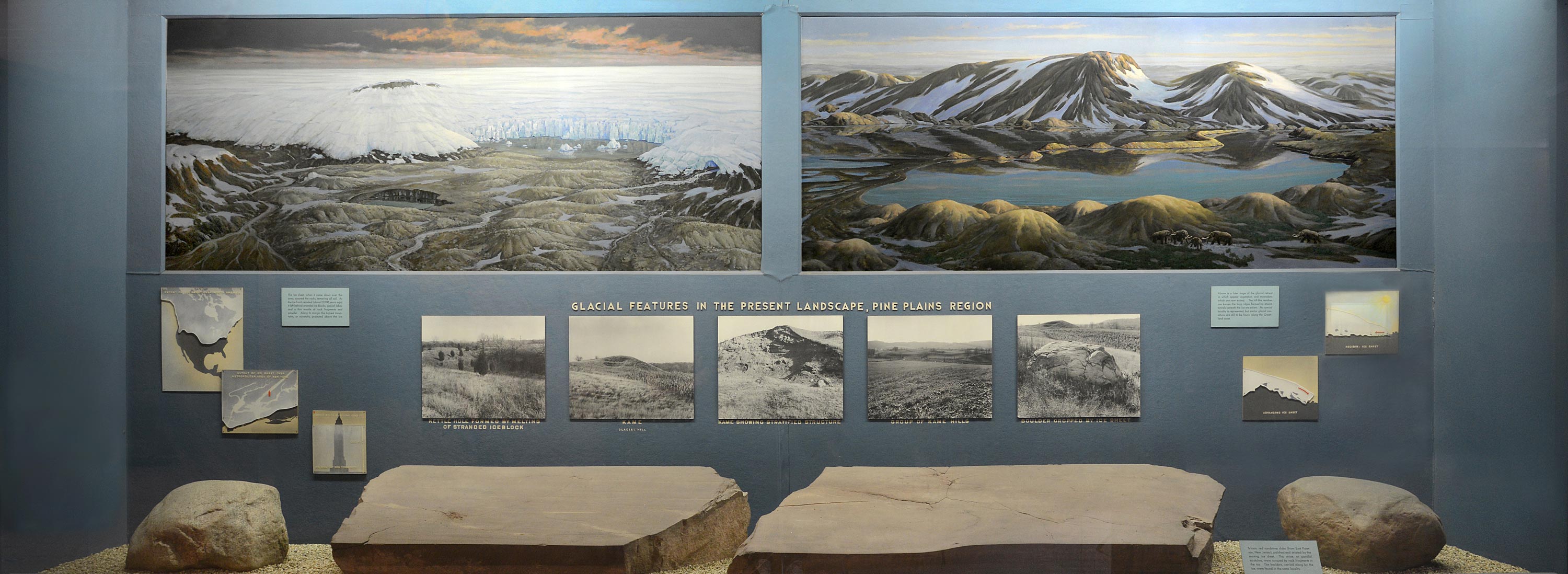 Museum case showing paintings of ice sheet and glacial retreat and sandstone slabs among other pictures and text.