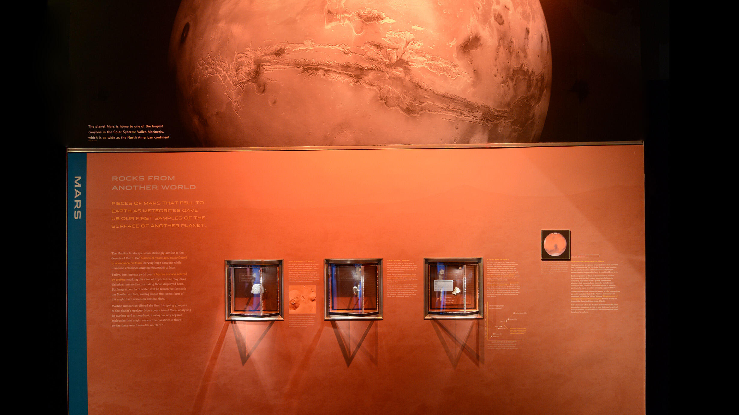 Mars section in the Hall of Meteorites, showing three meteorites, text and images.