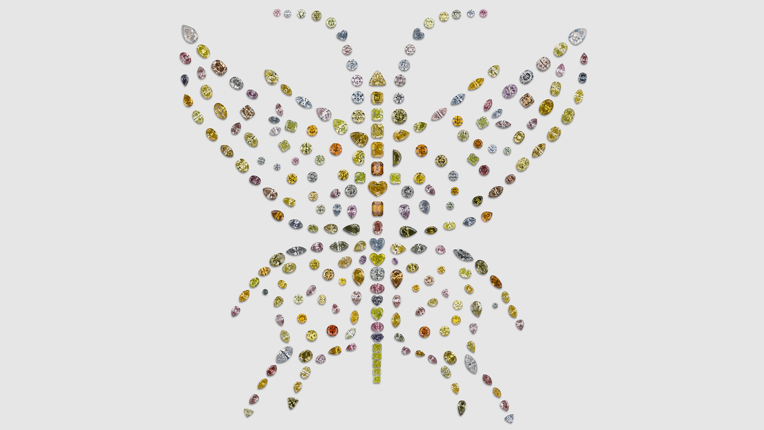 240 natural, fancy colored diamonds arranged in the shape of a butterfly.