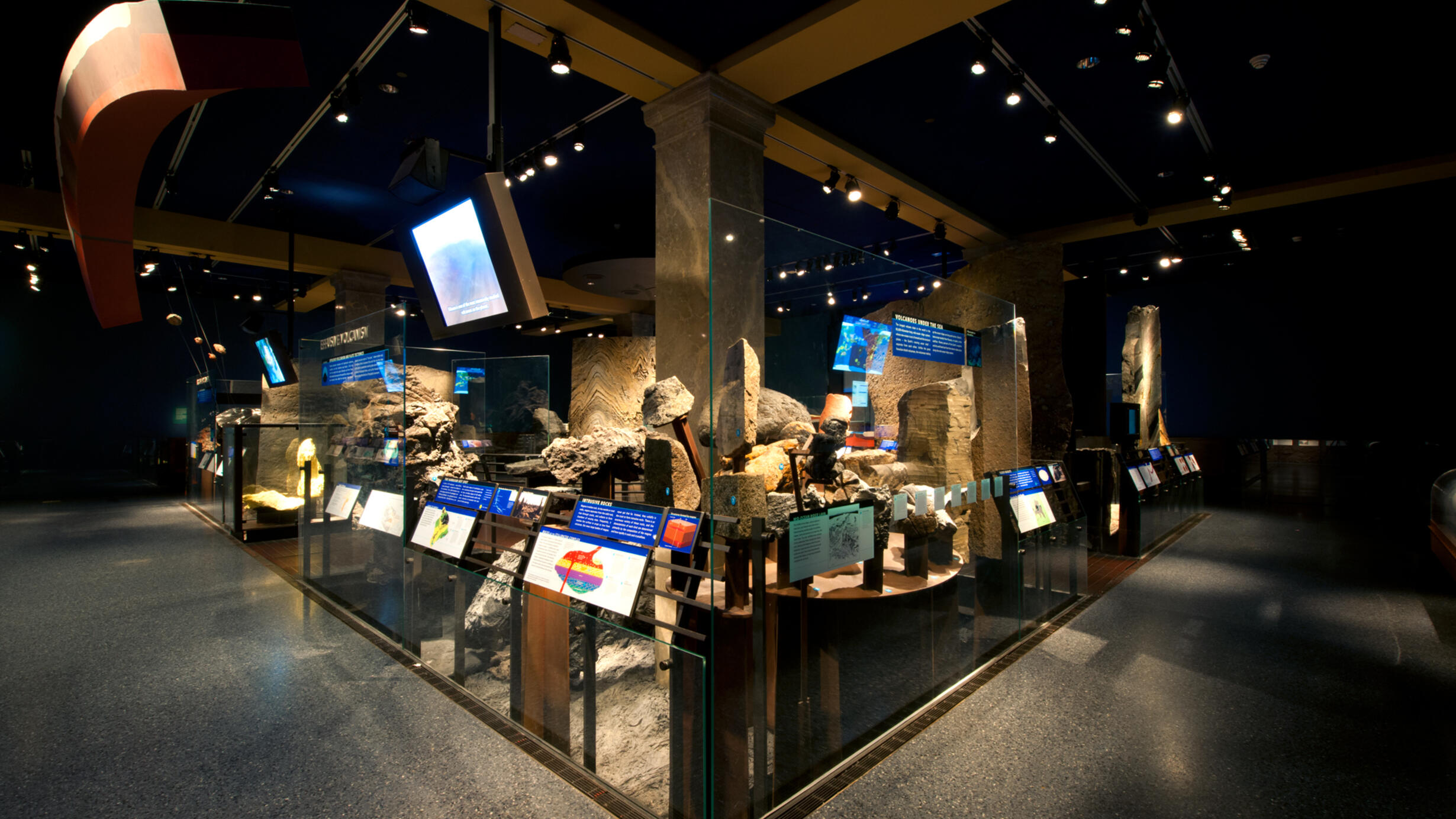 Exhibition hall with rock samples and explanation screens.