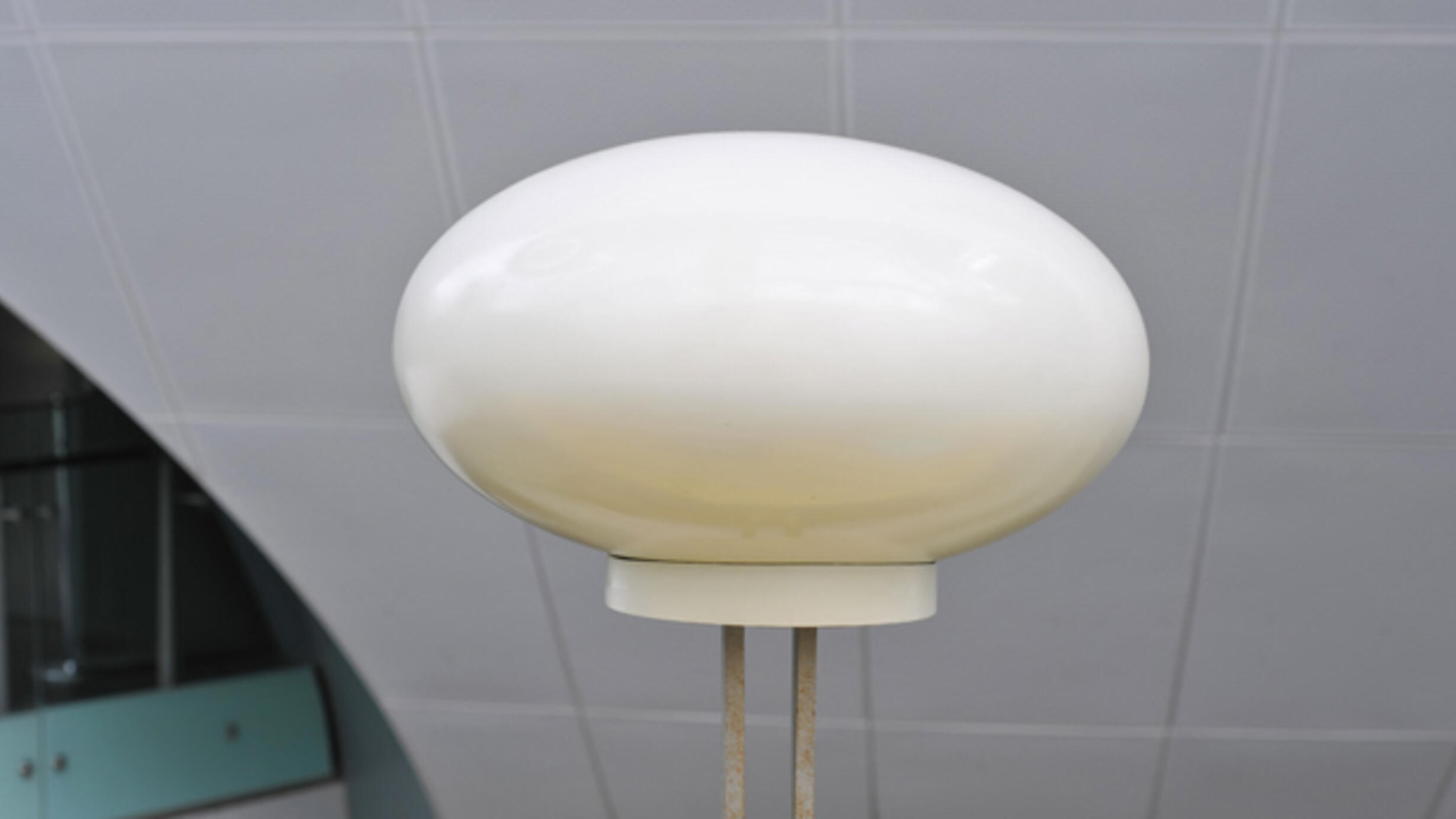 Photo of three-dimensional white ovoid form on a stand