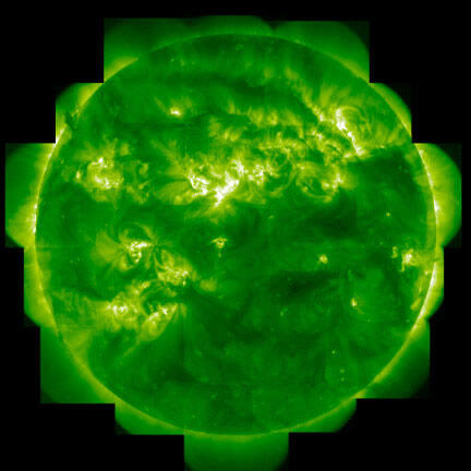 Photo of the Sun captured in the color green.