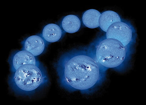 A ring of ten blue glowing suns with magnetic fields of varying sizes.