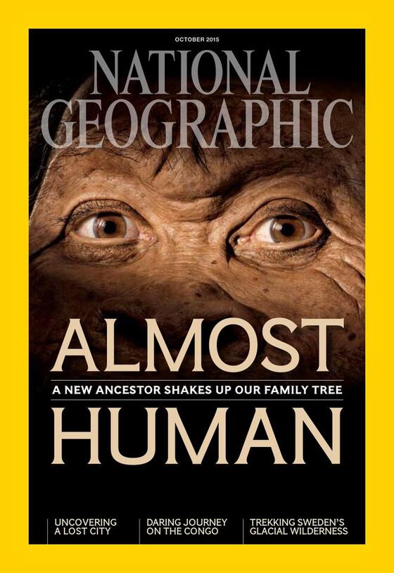 National Geographic cover from October 2015 with the headline "Almost Human: A New Ancestor Shakes Up Our Family Tree" over a close-up on a primate's eyes.