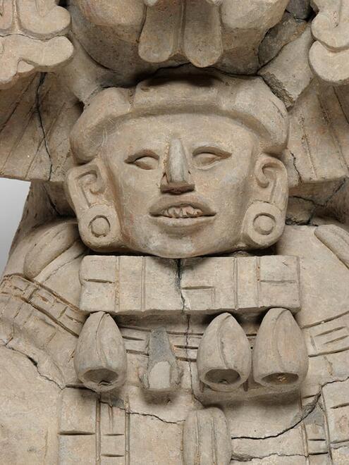close-up of 2nd smaller head on Zapotec urn