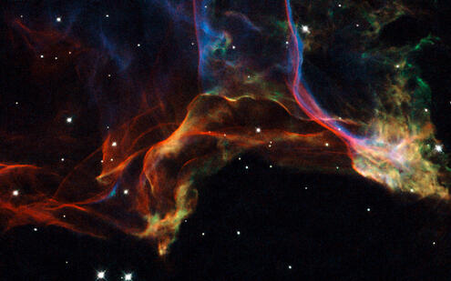 The Cygnus Loop, a large supernova remnant.