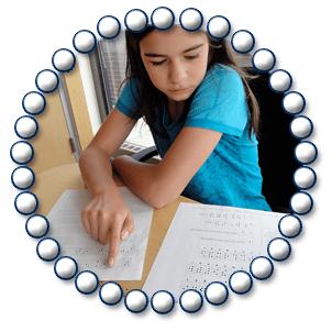 Girl reading Braille message