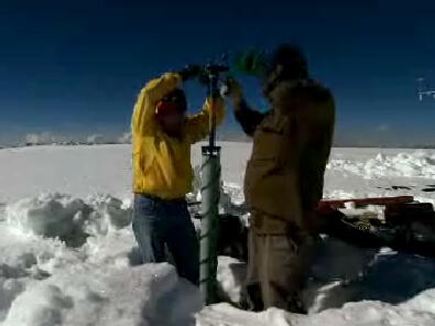 scientists taking ice core