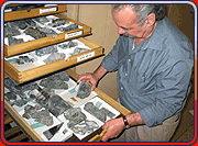 Ed opening drawers of the rock collection