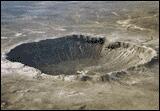 Large crater probably caused by a meteor hitting Earth.