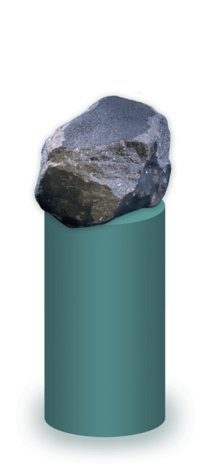 Chondrite Meteorite sitting on a pedestal