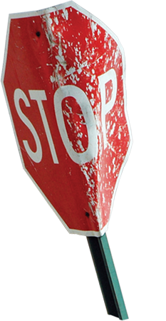 Stop sign warped by tornado.