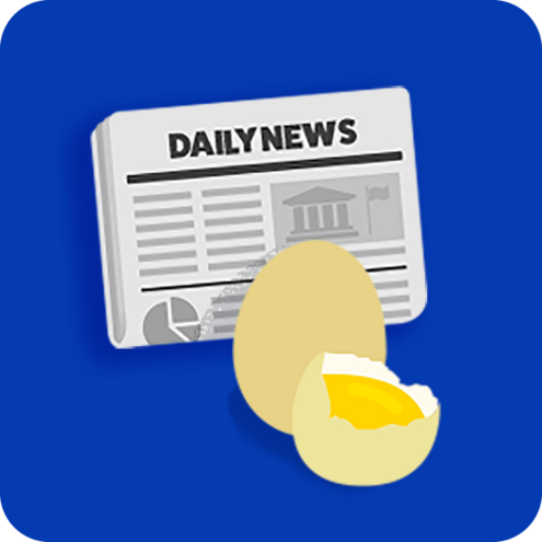 A newspaper, and two eggs; one egg is broken showing the yolk.