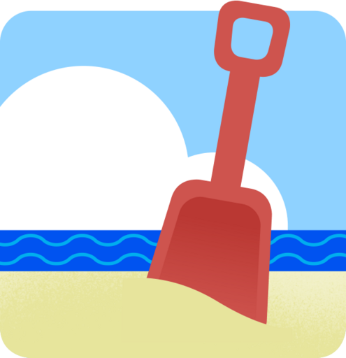 A plastic shovel in beach sand, with the surf and puffy clouds in the background.