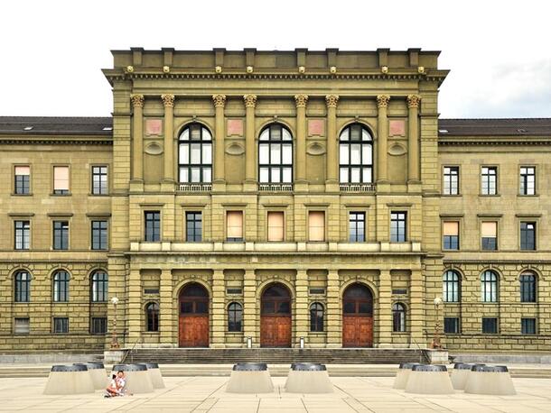 3-story building with columns, steps, and large windows on the ETH Zurich campus. 