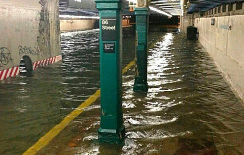 Photograph of 86th Street subway station in New York City flooded after Hurricane Sandy