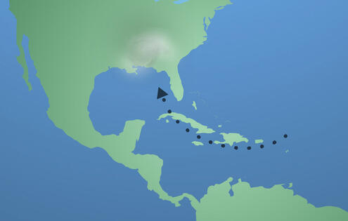 Map marking a path through the Caribbean and the Gulf of Mexico with an arrow pointing toward the Gulf Coast.