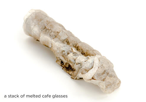 a stack of melted café glasses