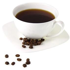 A cup of coffee on white background with several coffee beans