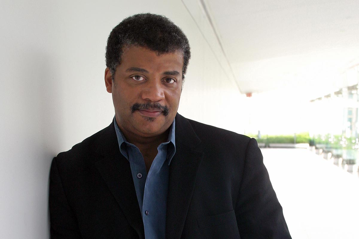 Neil Degrasse Tyson pictured from the shoulders up.
