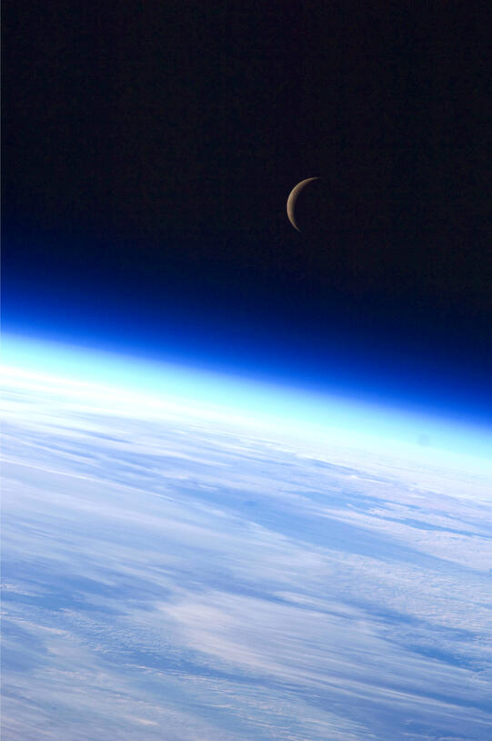 Earth and Crescent Moon from ISS