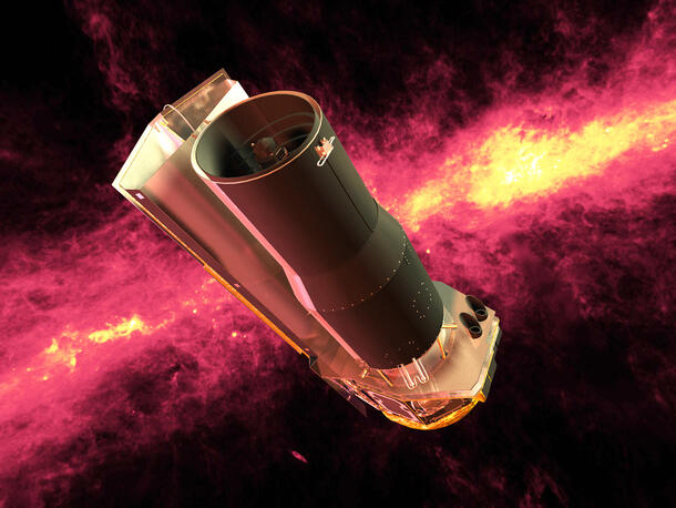 The Spitzer Space Telescope against the infrared sky.