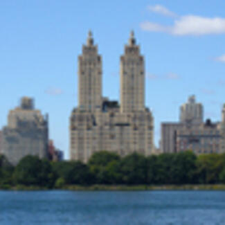 The San Remo apartment building and some neighboring buildings as seen from Central Park.