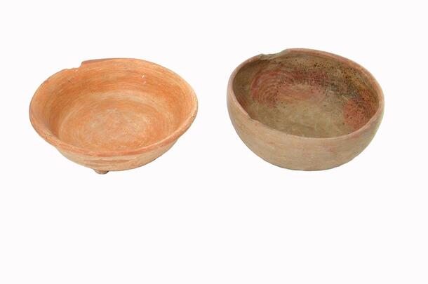 Two shallow ceramic bowls.