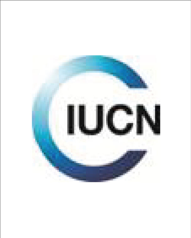 Logo with text "IUCN" at the center of a gradient colored "C" shape.