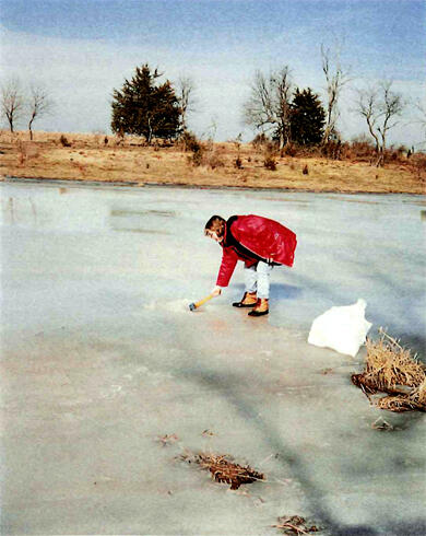 Figure 10: Chopping ice for water sample