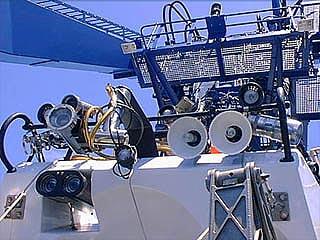 Close-up of equipment, including lights, mounted on the top of the submersible ALVIN.