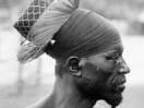 A person from the northeastern Democratic Republic of the Congo pictured in profile, wearing a head wrap.