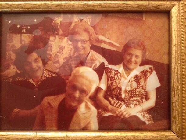 Framed photograph of four women