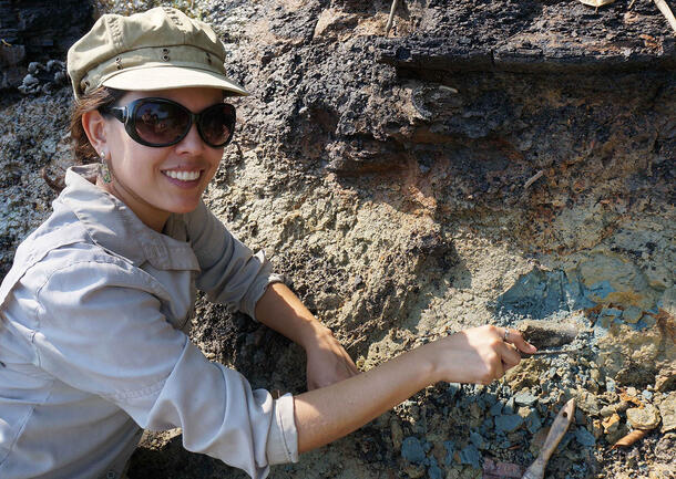 Julia Tejada-Lara works on fossil excavation in the field.