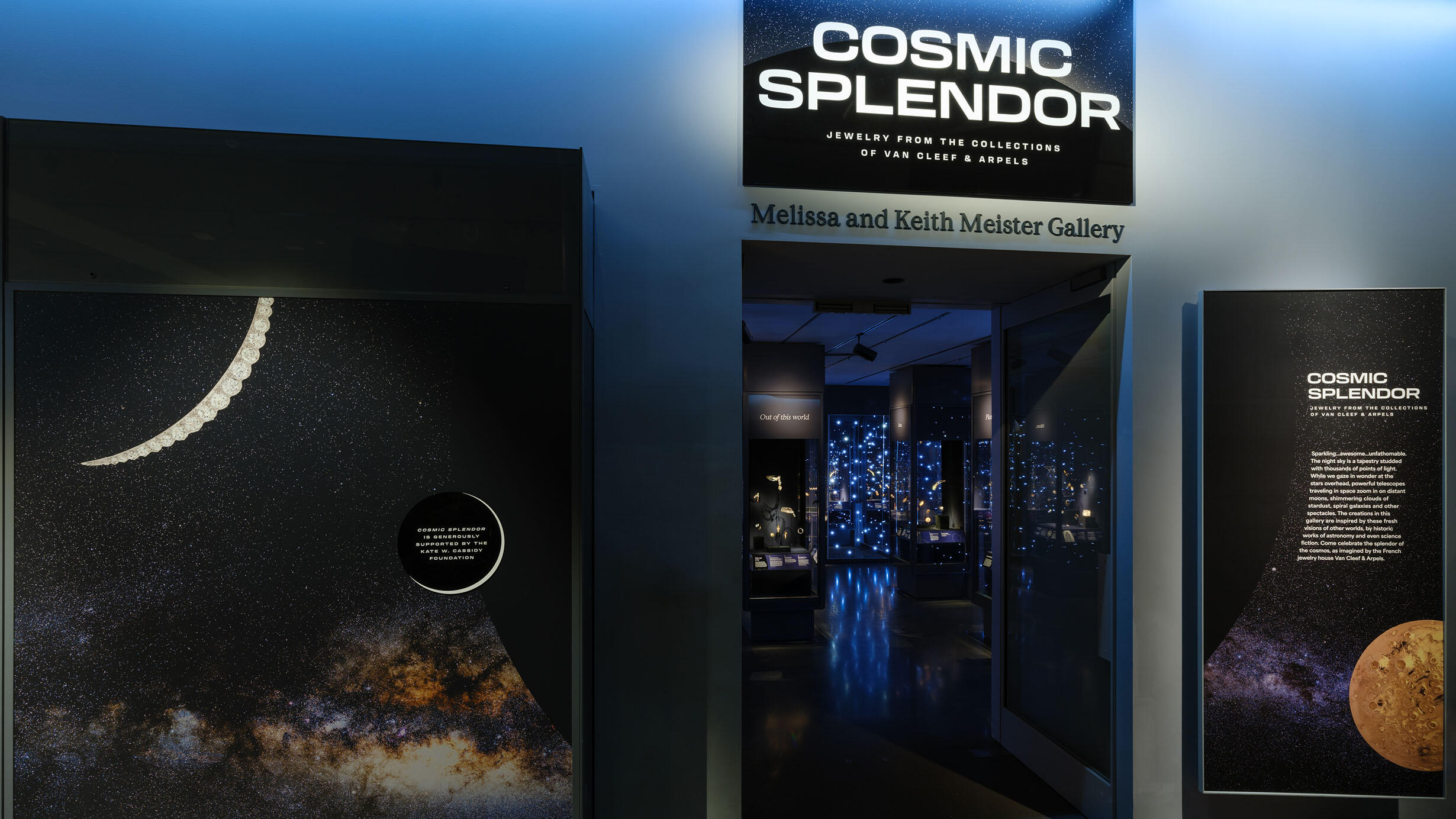 The entrance to Cosmic Splendor at the Melissa and Keith Meister Gallery with images of space outside and glowing displays inside the gallery.