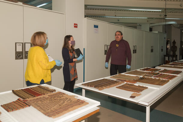 While in Collections, Mr. Grignon shared his knowledge about pieces in the Menominee collection with members of the Cultural Resources Office.