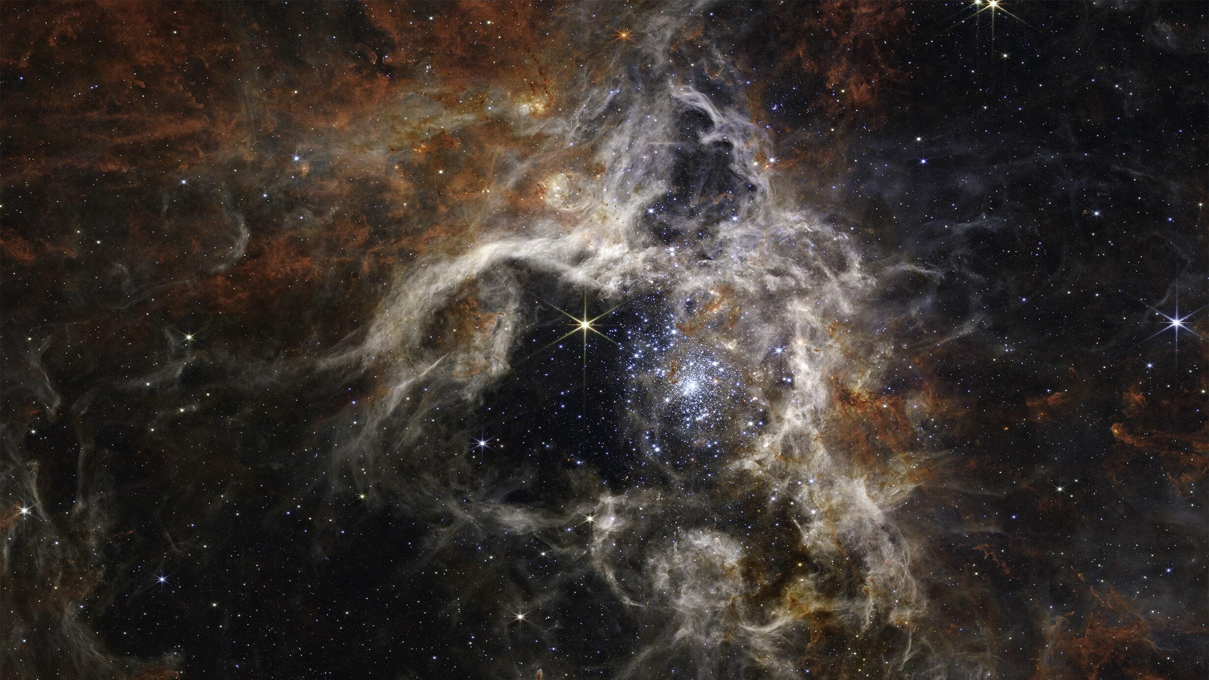 The Tarantula Nebula star-forming region, in a mosaic image spanning 340 light-years across, assembled from images captured by the James Webb telescop