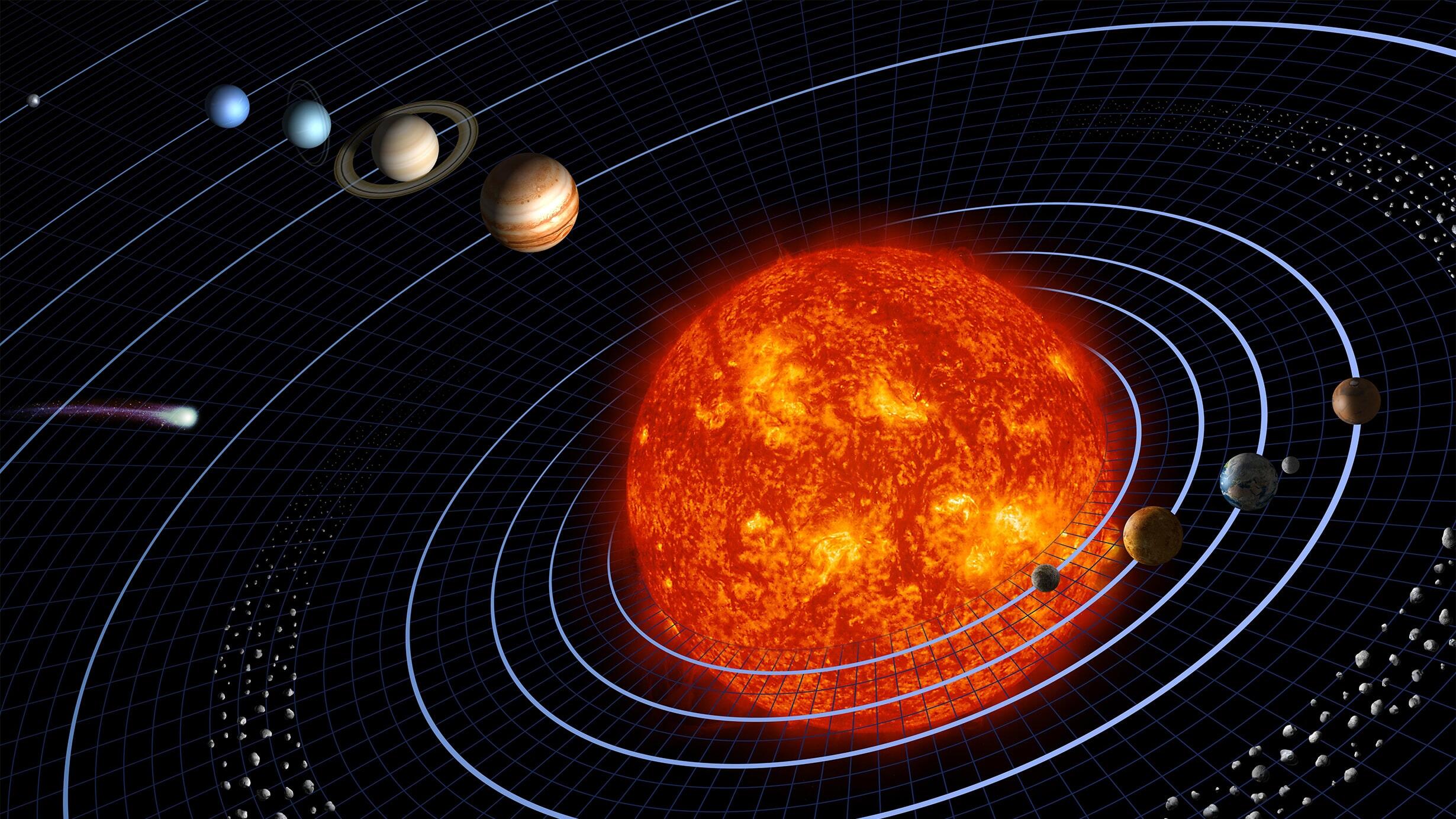 An artist's depiction of the solar system, with eight planets in concentric orbits around the sun.