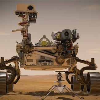 NASA's Perseverance rover on the surface of Mars. Four tires with thick treads carry cameras and other scientific equipment.