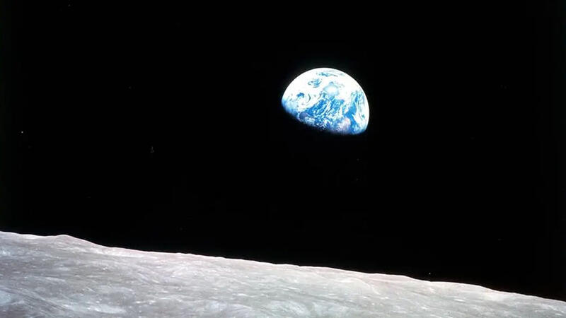 View of planet earth from the surface of the moon.