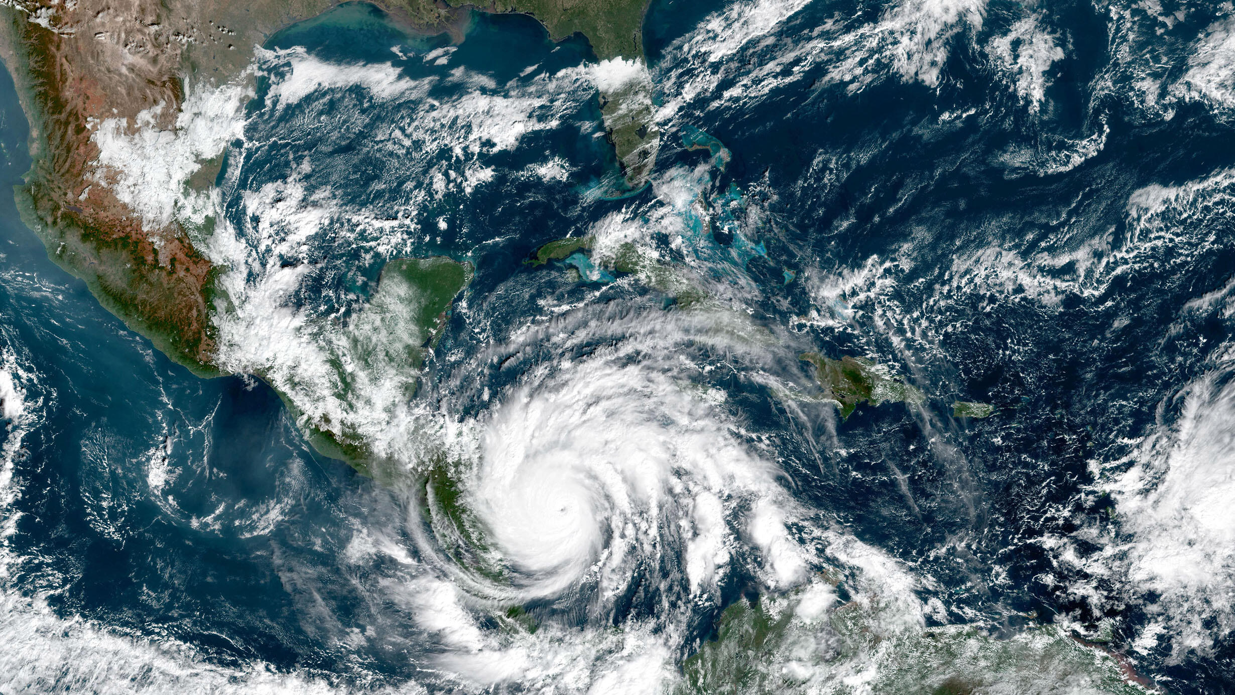 Aerial view of a swirling cloud mass over Central America.