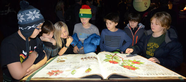 Visitors with Enchanted Book
