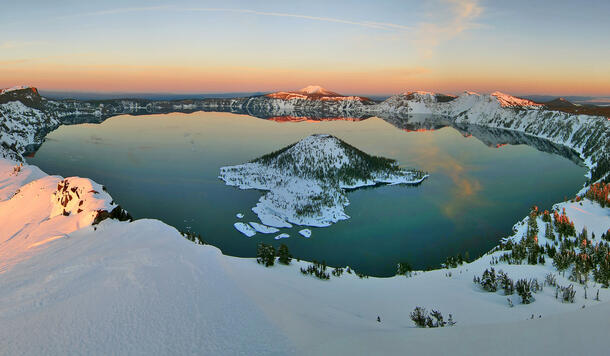 Aerial view of the sunrise over Crater Lake.