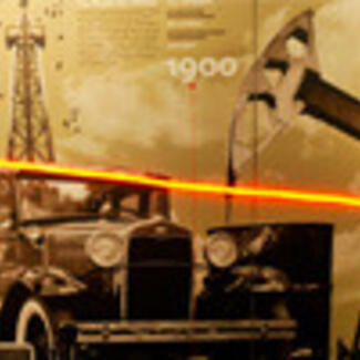 A composite photo that shows an old model T automobile and an oil pump with the year 1900 superimposed above them.