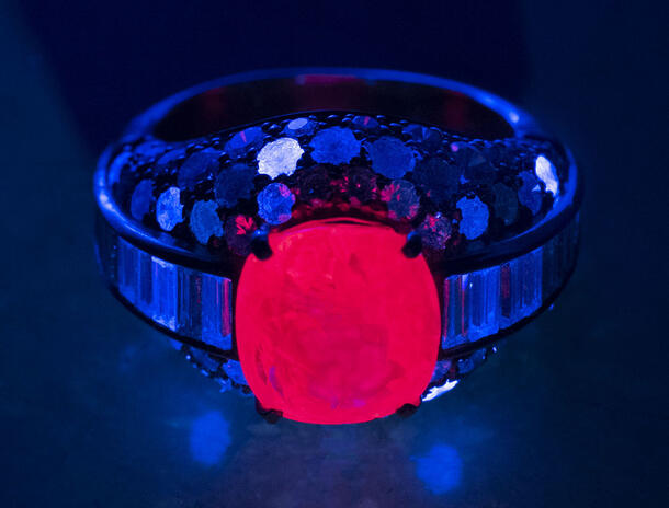 Ring set with a large ruby that glows under UV light.